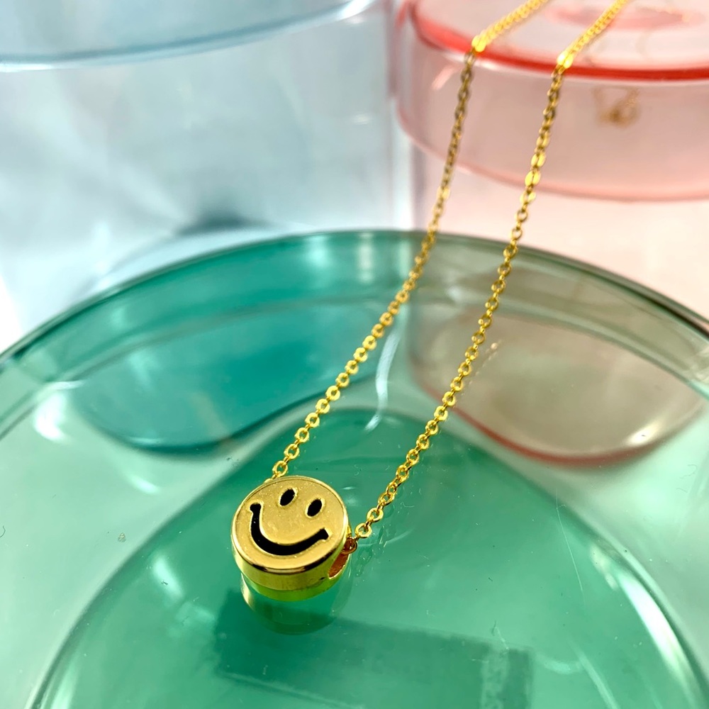 3/$15 gold smiley face necklace